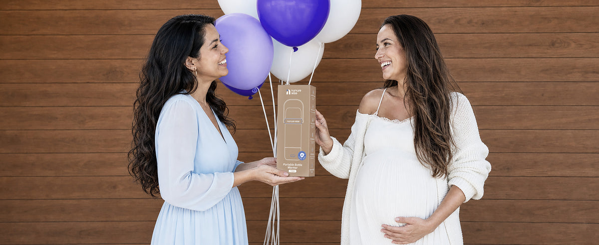 Expecting parent receives boxed NurtureWise warmer with purple balloons