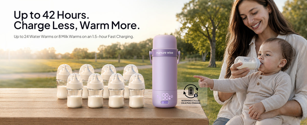 Parent feeds a baby outdoors beside the purple warmer and bottles